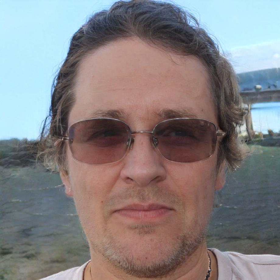 Nils Bergström, technical director reviewing game development code and mechanics