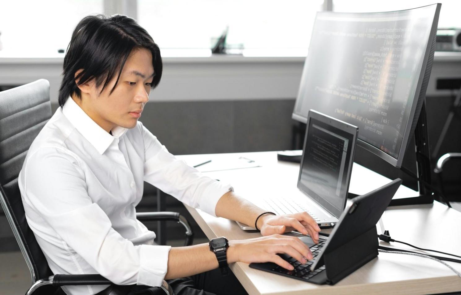 Team discussion around mobile game interface designs